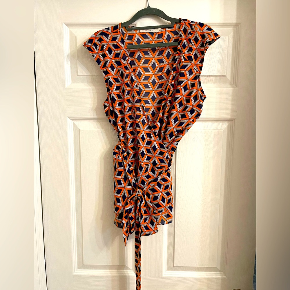 Lucy Paris. Navy/Burnt Orange deep V neck Blouse